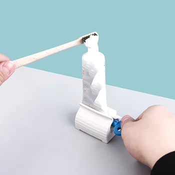 1Pcs פלסטיק מסחטת משחת שיניים מכבש רב-תכליתי צינור מתגלגלות בעל מתקן רחצה טיפול אוראלי אביזרים לבית